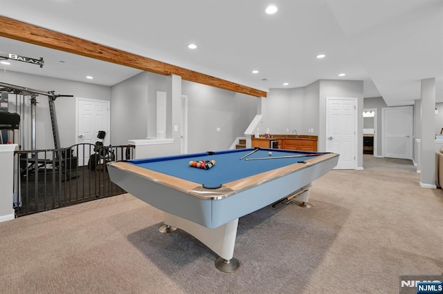 playroom with beamed ceiling, recessed lighting, and light carpet