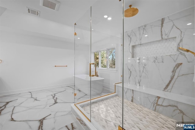 bathroom with visible vents, a marble finish shower, recessed lighting, a freestanding bath, and marble finish floor