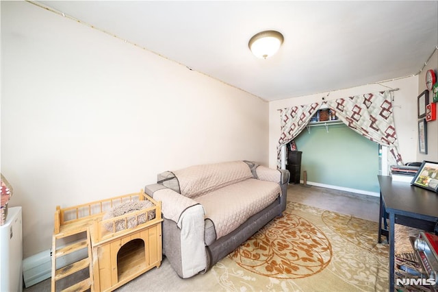 bedroom featuring baseboards