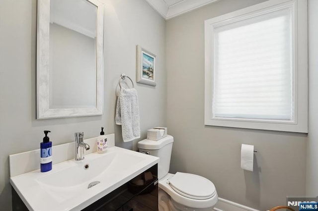 half bath with toilet and vanity