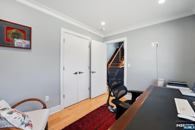 office space featuring ornamental molding, recessed lighting, and wood finished floors