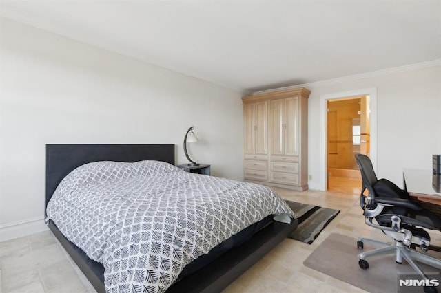 bedroom with baseboards and ornamental molding