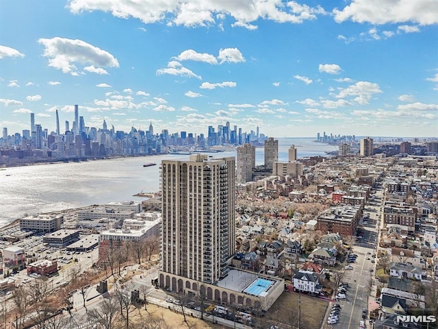 property's view of city featuring a water view