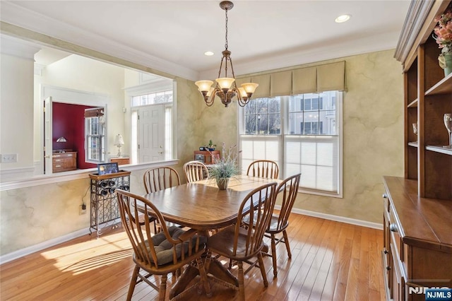 dining room featuring recessed lighting, baseboards, light wood-style floors, and an inviting chandelier