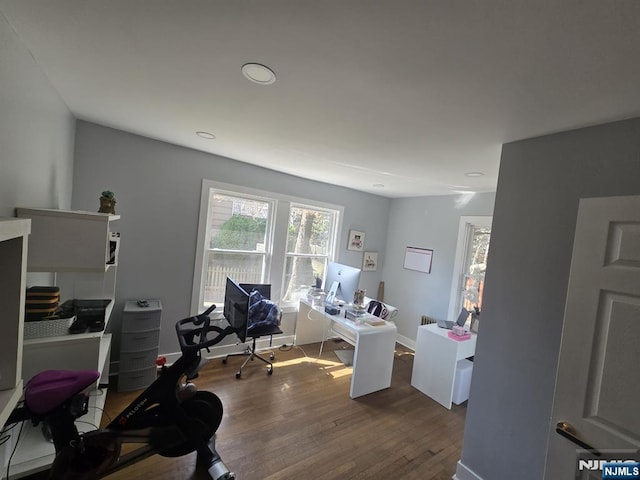 office with baseboards and dark wood-style floors