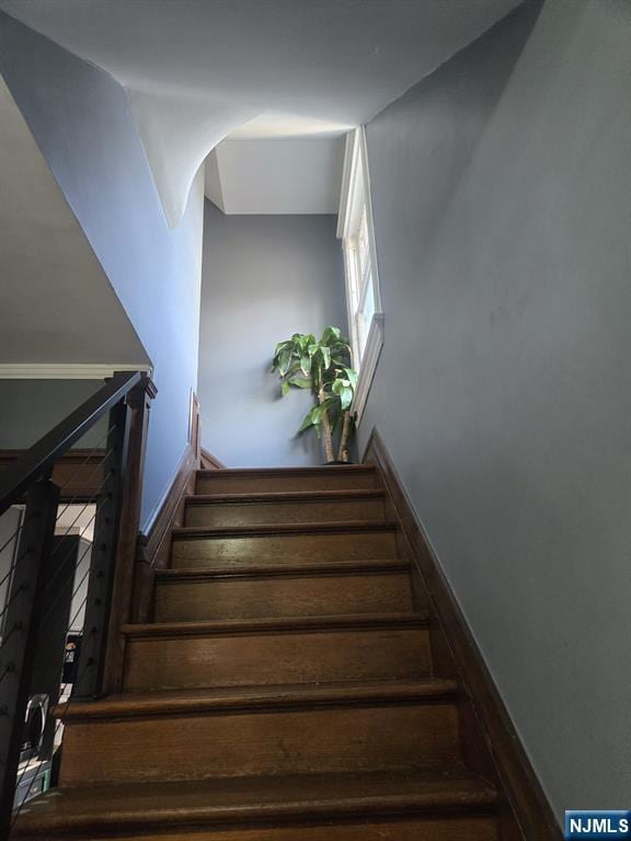 stairway with baseboards