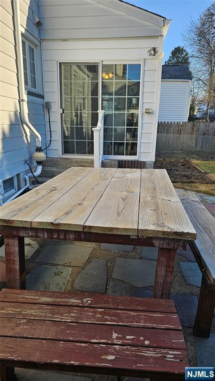 wooden deck featuring fence