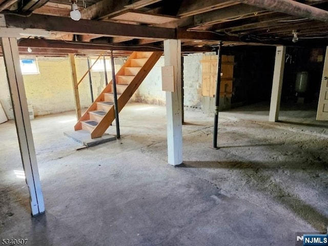 basement featuring stairway