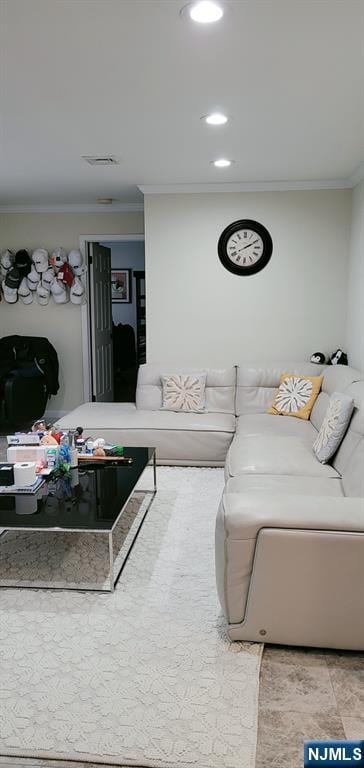 living room with recessed lighting, visible vents, and ornamental molding