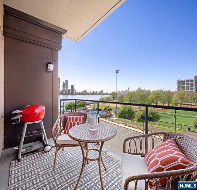 balcony featuring a city view