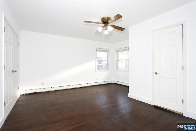 unfurnished bedroom with dark wood-type flooring, a ceiling fan, baseboards, and baseboard heating