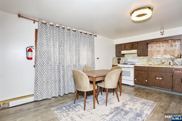 dining area featuring wood finished floors