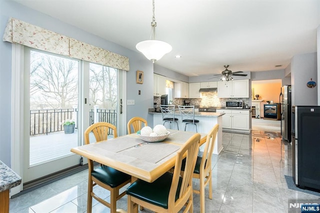 dining room with recessed lighting and ceiling fan