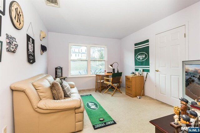 office featuring visible vents and carpet floors