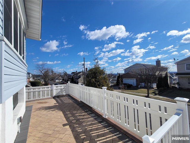 view of patio / terrace featuring a residential view