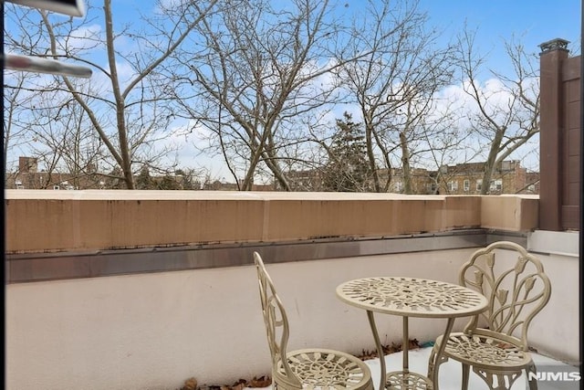 view of patio / terrace featuring a balcony