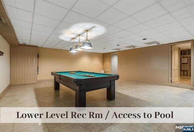 recreation room featuring visible vents, baseboards, tile patterned floors, a paneled ceiling, and billiards