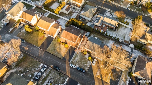 birds eye view of property with a residential view