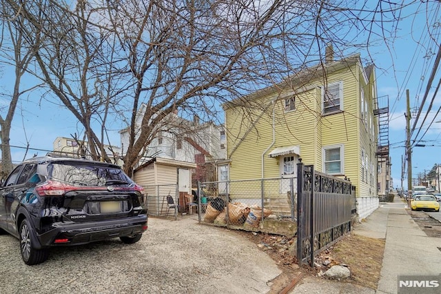 view of front of property with fence