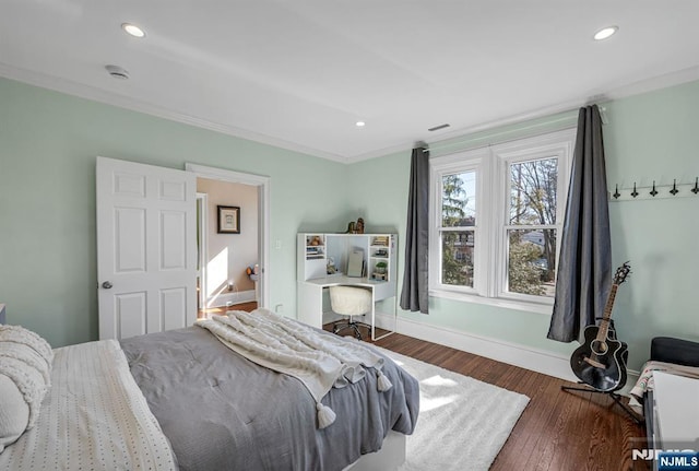 bedroom featuring recessed lighting, wood finished floors, and baseboards