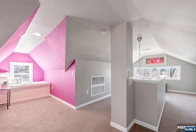 bonus room with visible vents, baseboards, carpet, and lofted ceiling