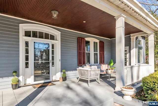 view of patio featuring a porch