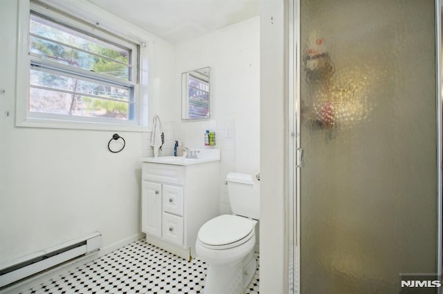 full bathroom featuring a baseboard heating unit, toilet, vanity, and a stall shower