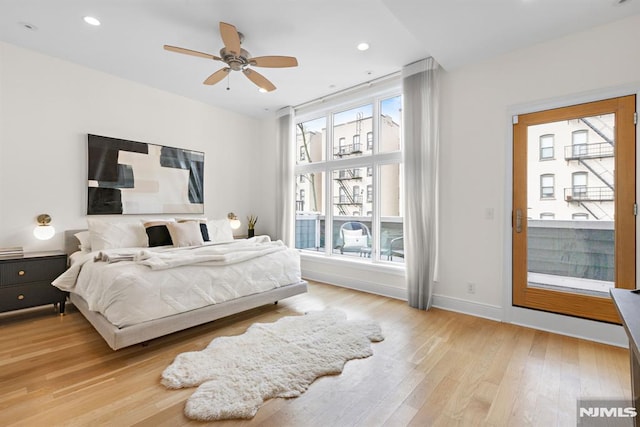 bedroom featuring recessed lighting, baseboards, and light wood finished floors