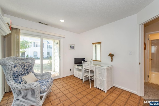 home office featuring visible vents, recessed lighting, a textured ceiling, and baseboards