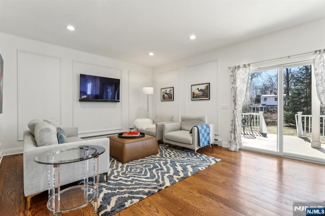 living area featuring recessed lighting and wood finished floors