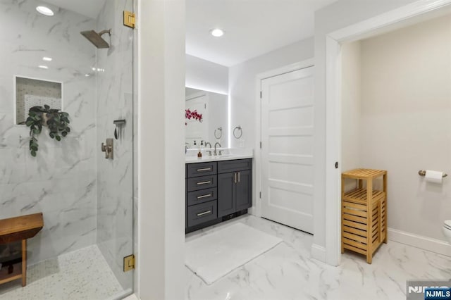 bathroom featuring toilet, marble finish floor, and a marble finish shower