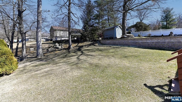 view of yard featuring fence