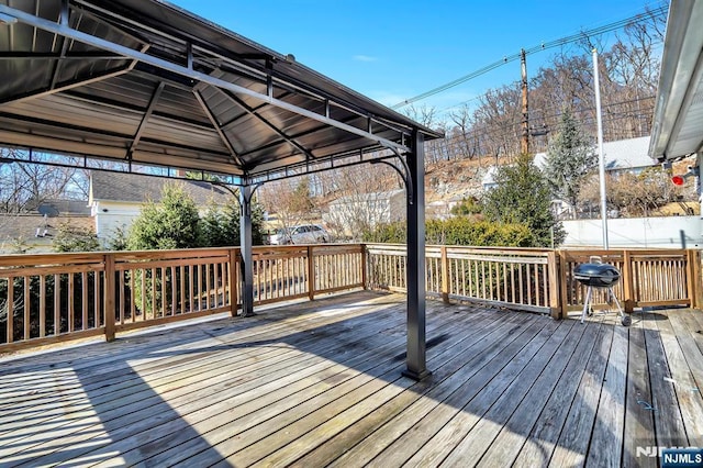 deck featuring a gazebo and area for grilling