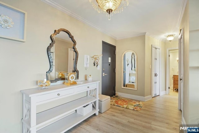 bedroom featuring crown molding, baseboards, and wood finished floors