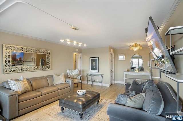 living room featuring crown molding, wood finished floors, and baseboards