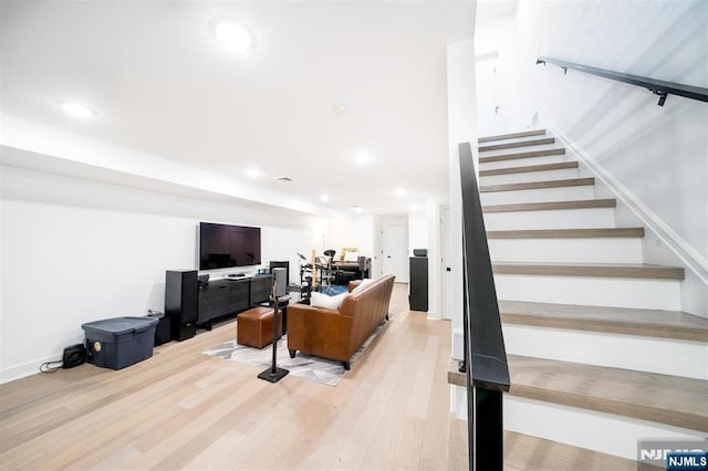 interior space with light wood-style flooring and recessed lighting