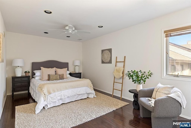 bedroom featuring dark wood finished floors, recessed lighting, and baseboards