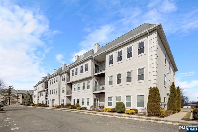 view of building exterior featuring a residential view