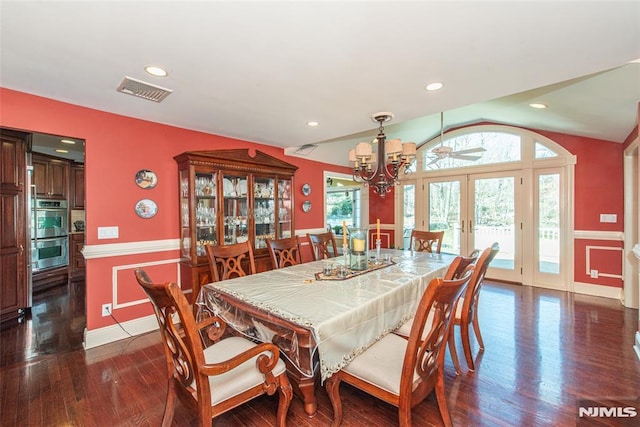 dining area featuring visible vents, dark wood finished floors, recessed lighting, french doors, and lofted ceiling