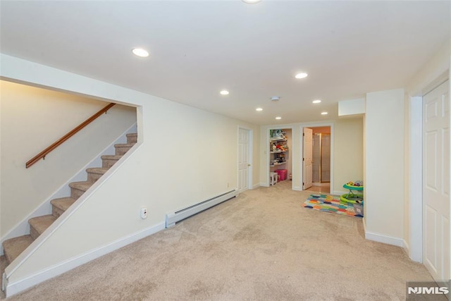 playroom featuring carpet flooring, recessed lighting, baseboards, and a baseboard radiator