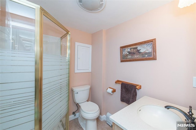 bathroom featuring vanity, visible vents, a stall shower, tile patterned flooring, and toilet