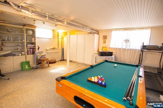 rec room with plenty of natural light and carpet flooring