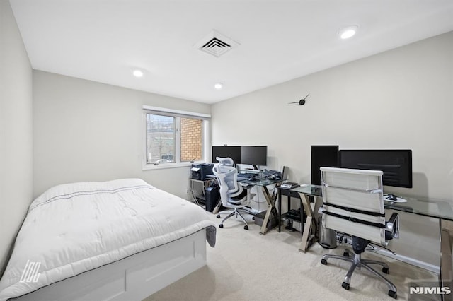 carpeted bedroom with recessed lighting and visible vents