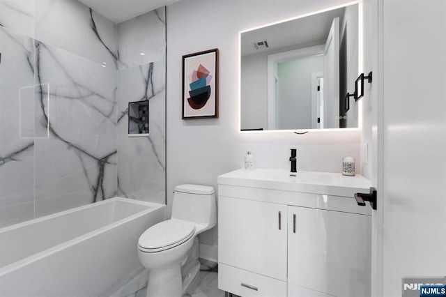 bathroom featuring visible vents, toilet, vanity, and shower / washtub combination