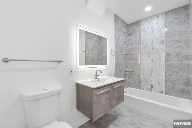 bathroom with recessed lighting, shower / bath combination, toilet, and vanity