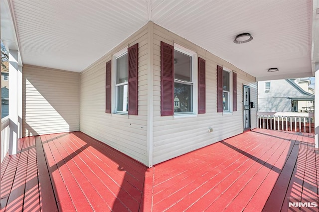 wooden terrace featuring a porch