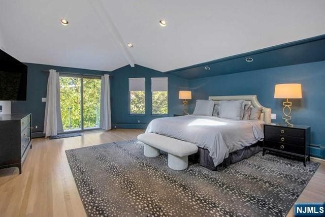 bedroom featuring recessed lighting, wood finished floors, and vaulted ceiling with beams