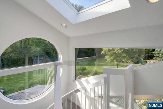 interior space featuring recessed lighting and a skylight