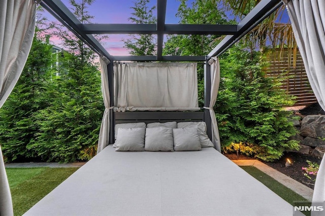 view of patio terrace at dusk