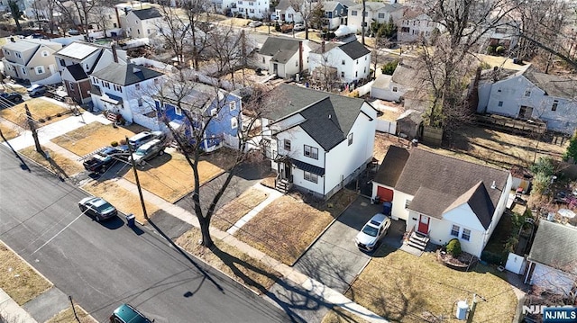 drone / aerial view with a residential view